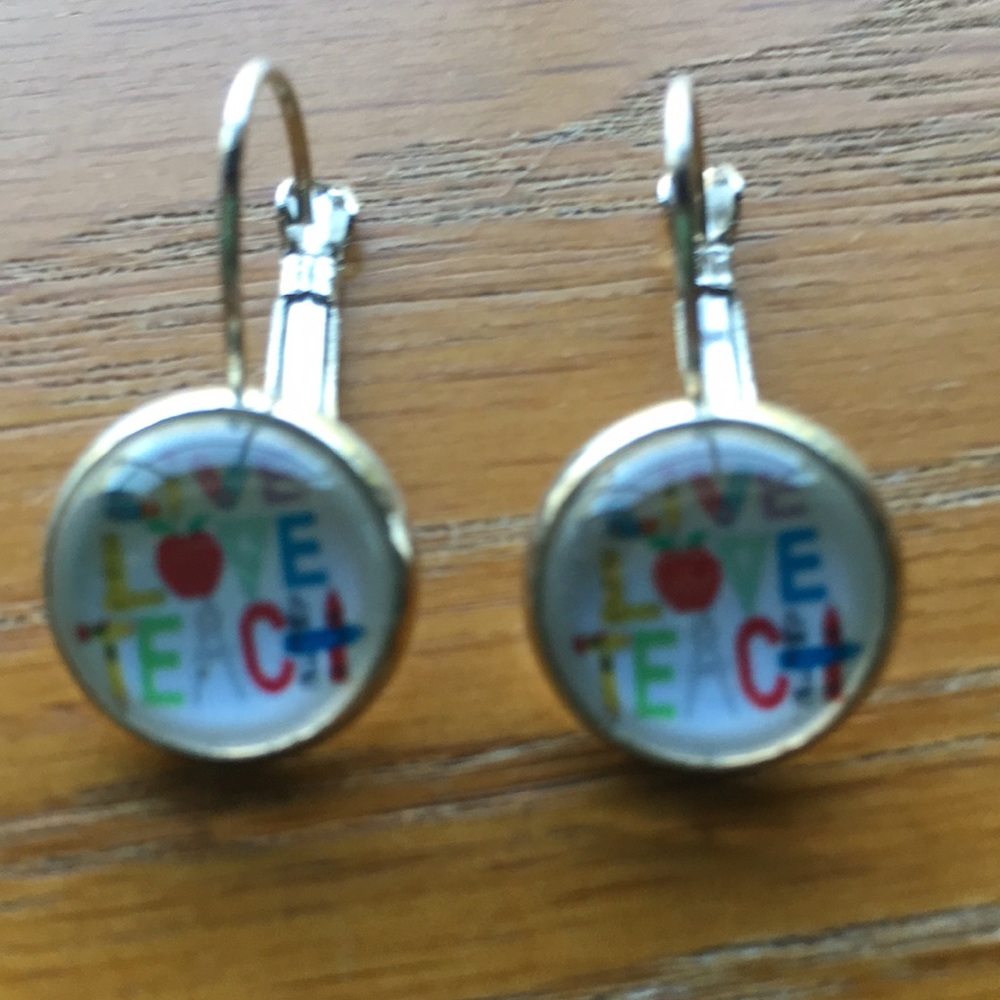 Earrings… Live love teach… Never worn